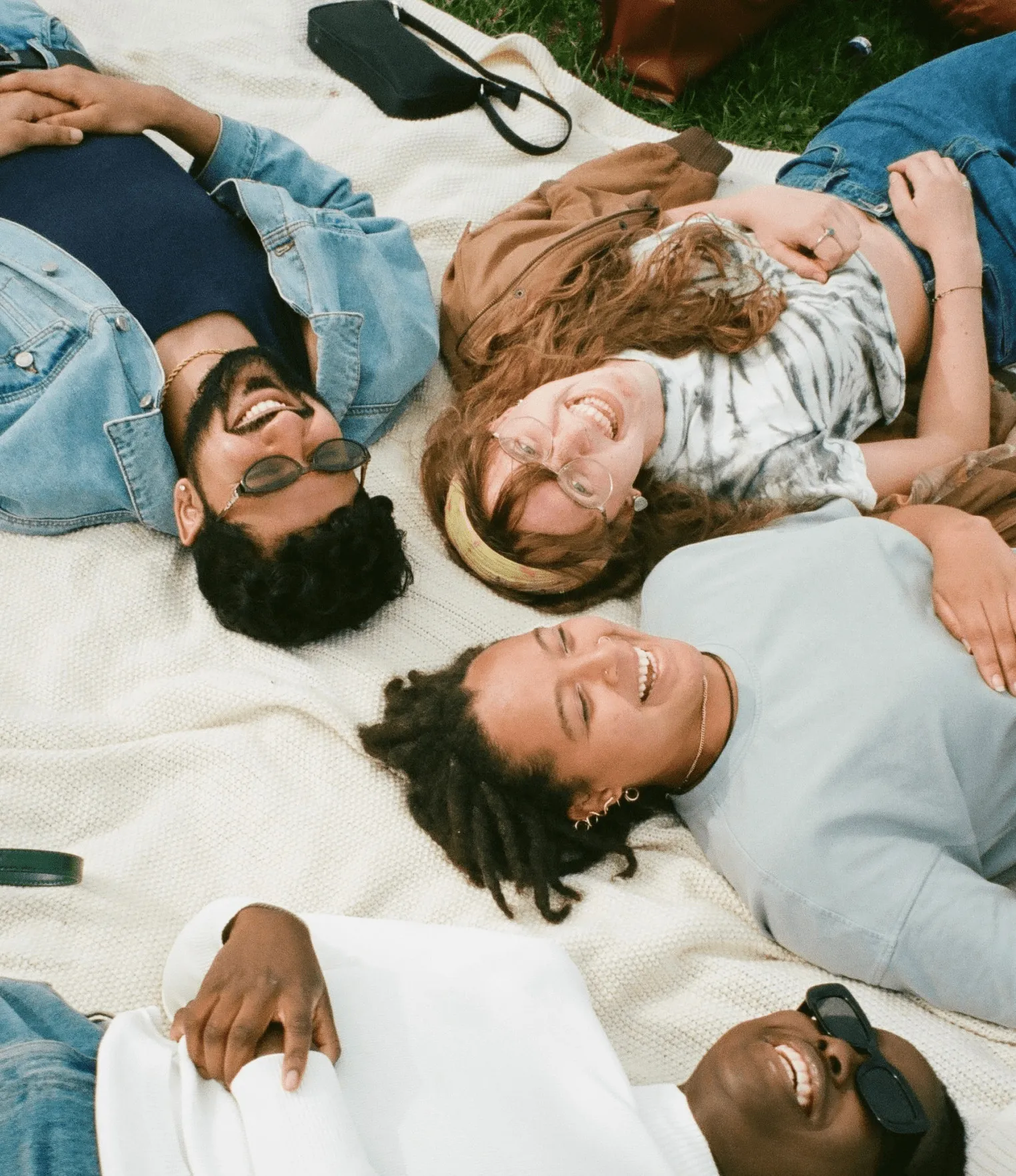 a group of people lying on the ground
